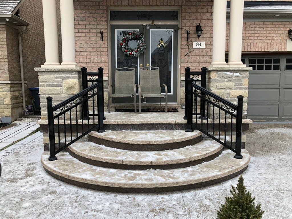 Black aluminum railings installed on a front porch in Toronto
